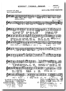 Çiçekler Takmış Başına